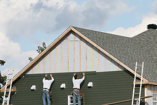 Professional Siding technician working in Conyers, GA
